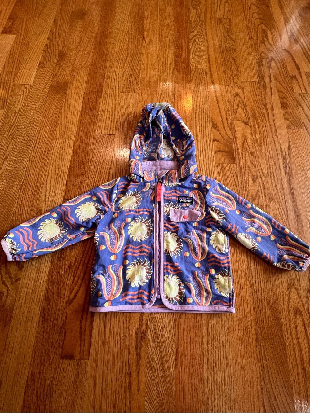Patagonia Baby Baggies Jacket Purple with Yellow Suns and Designs 12-18 months